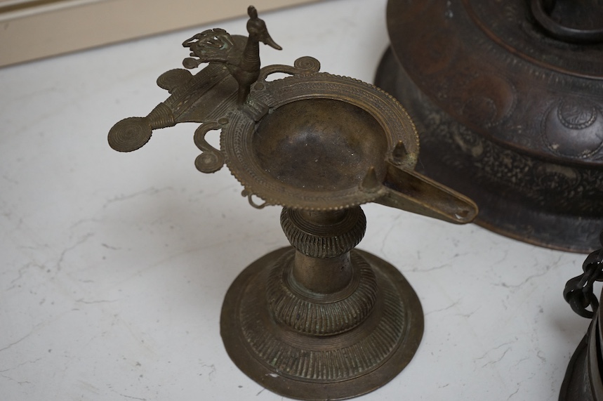 An Ethiopian Coptic processional cross, two Indian brass betel nut boxes together with other metalware and a set of miniature paintings, largest 51cm high. Condition - fair